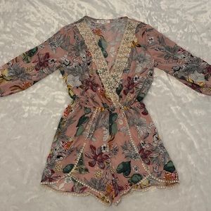 womens flowered romper with lace detailed